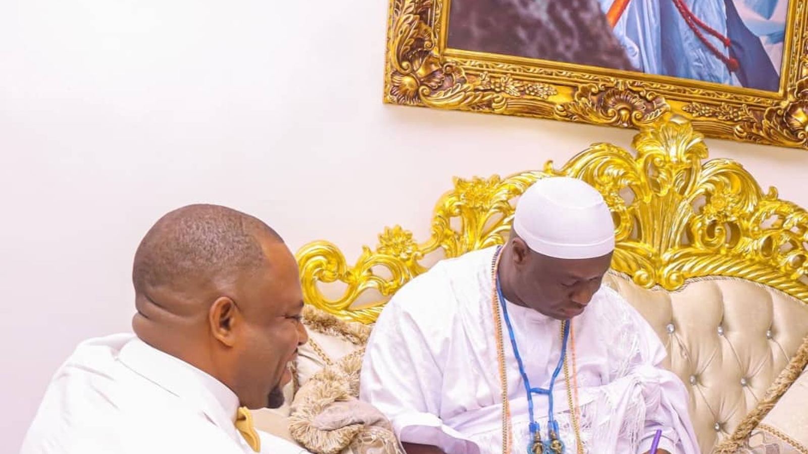 His Imperial Majesty the Ooni of Ife signing the Get Elevated Foundation royal patronage document