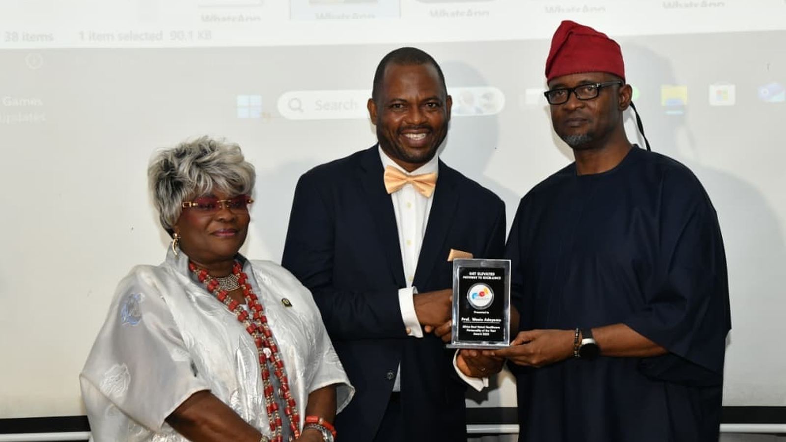 Award presentation to an honouree at a Get Elevated awards ceremony